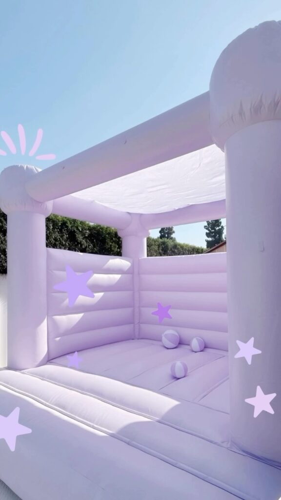 Lavender bounce house with pastel stars