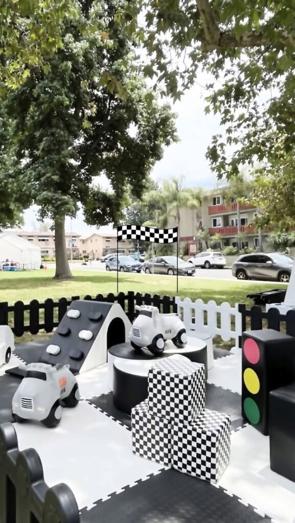 Black and white race car theme soft play